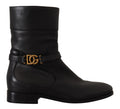 Chaussures Dolce & Gabbana en cuir noir, bottines courtes avec logo, plates et élégantes.