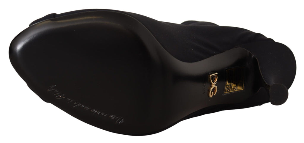 Bottines noires Dolce & Gabbana en stretch et à hauteur de cheville, élégantes et modernes, pour femmes.