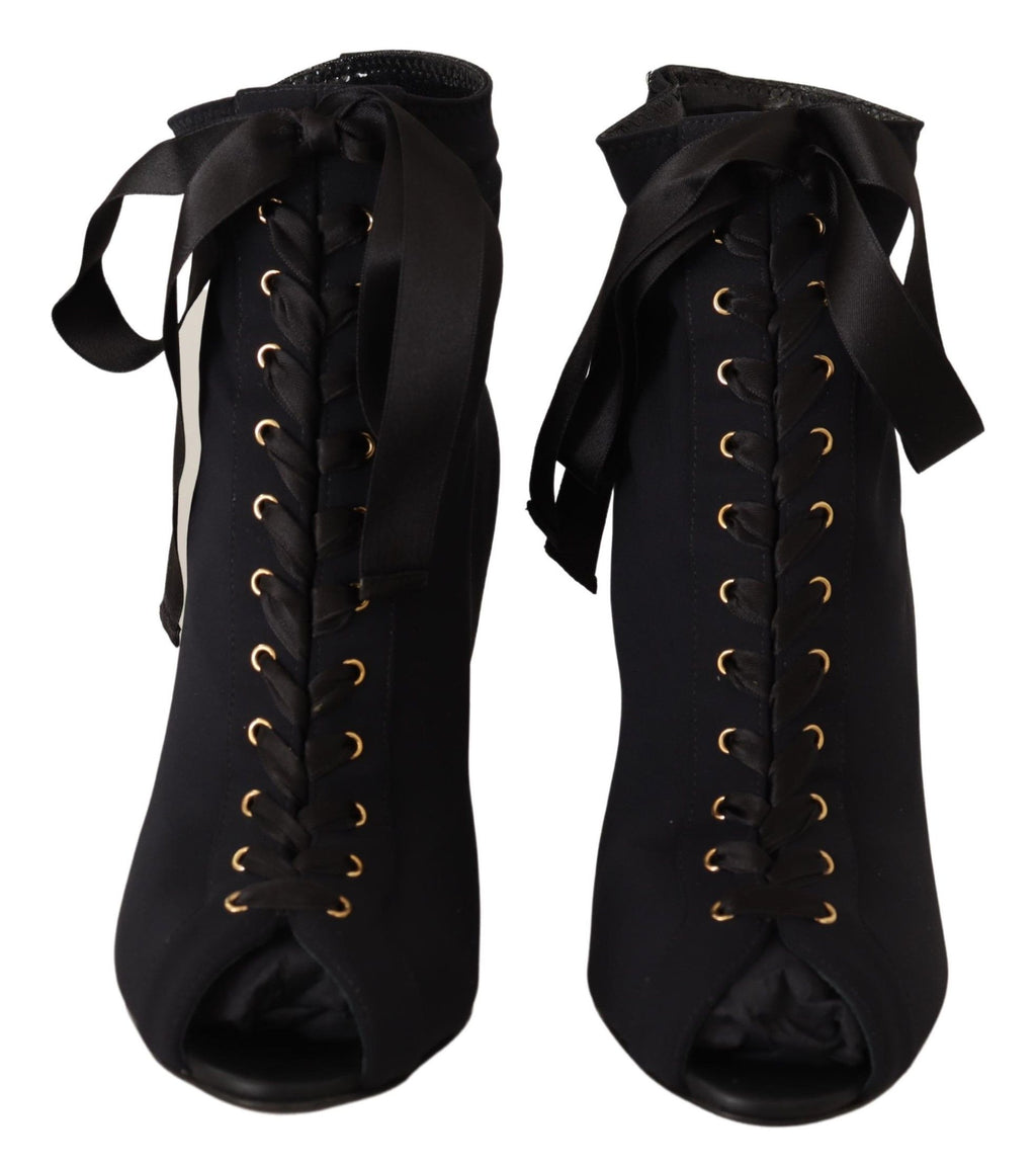 Chaussures bottines noires Dolce & Gabbana, bottines extensibles à la cheville, style élégant et moderne, vue de face.