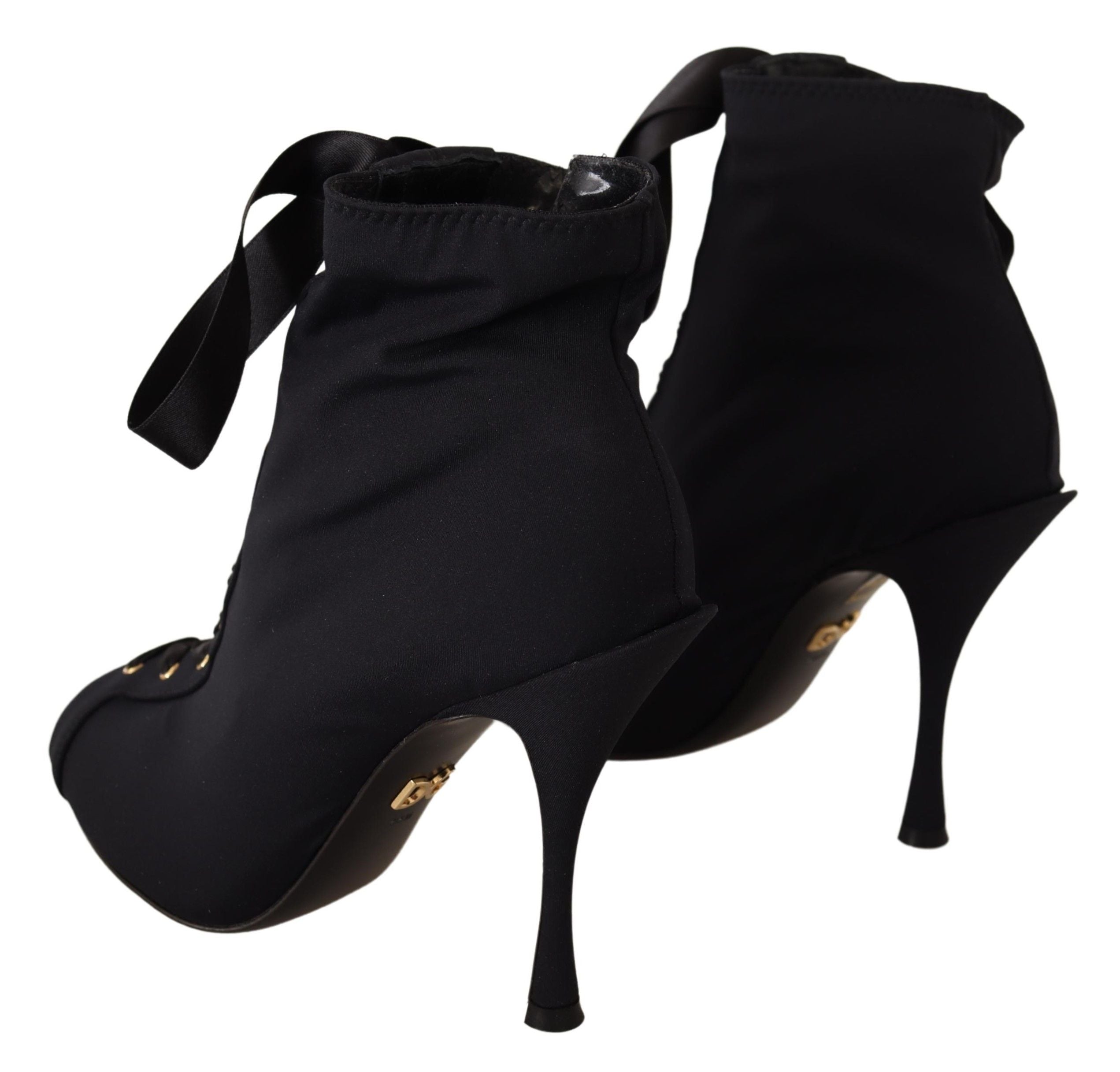 Chaussures bottines noires Dolce & Gabbana, stretch et ajustées à la cheville, style élégant et moderne.