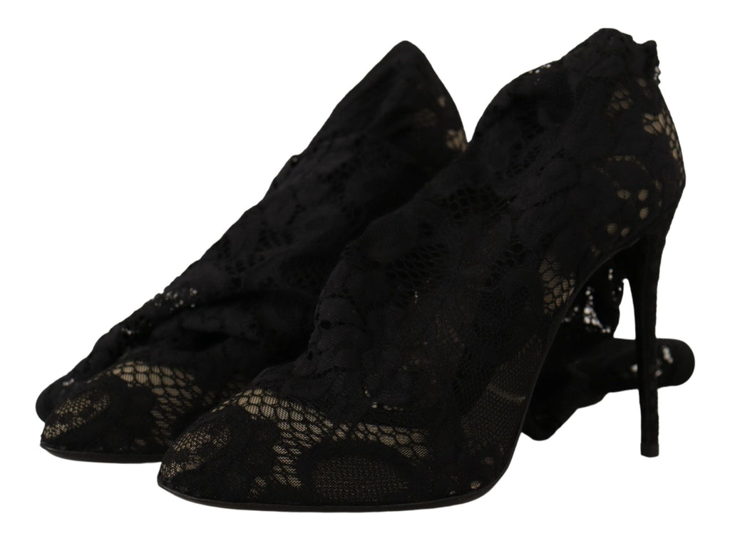 Chaussettes extensibles noires Dolce & Gabbana avec motifs en dentelle, portées avec des bottines élégantes Taormina.