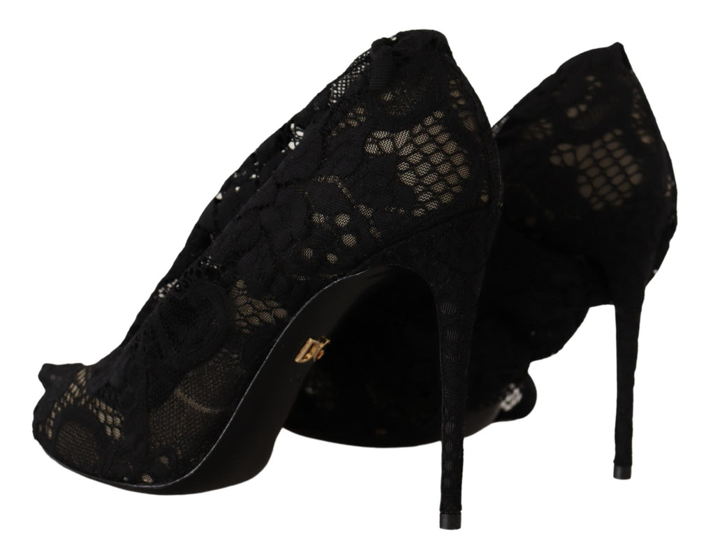 Chaussettes extensibles noires Dolce & Gabbana avec dentelle Taormina, portées avec des bottines élégantes.