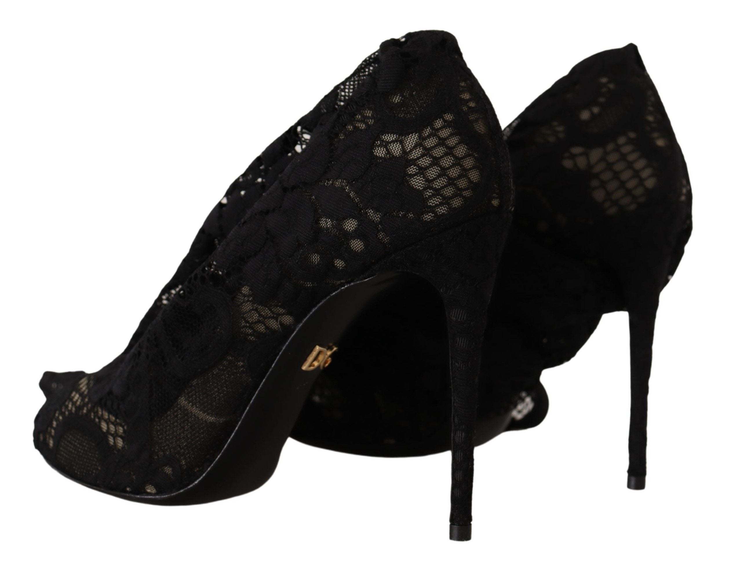 Chaussettes extensibles noires Dolce & Gabbana avec dentelle Taormina, portées avec des bottines élégantes.