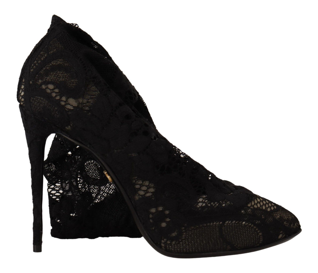 Chaussettes extensibles noires Dolce & Gabbana avec détails en dentelle Taormina portées avec des bottines en cuir.