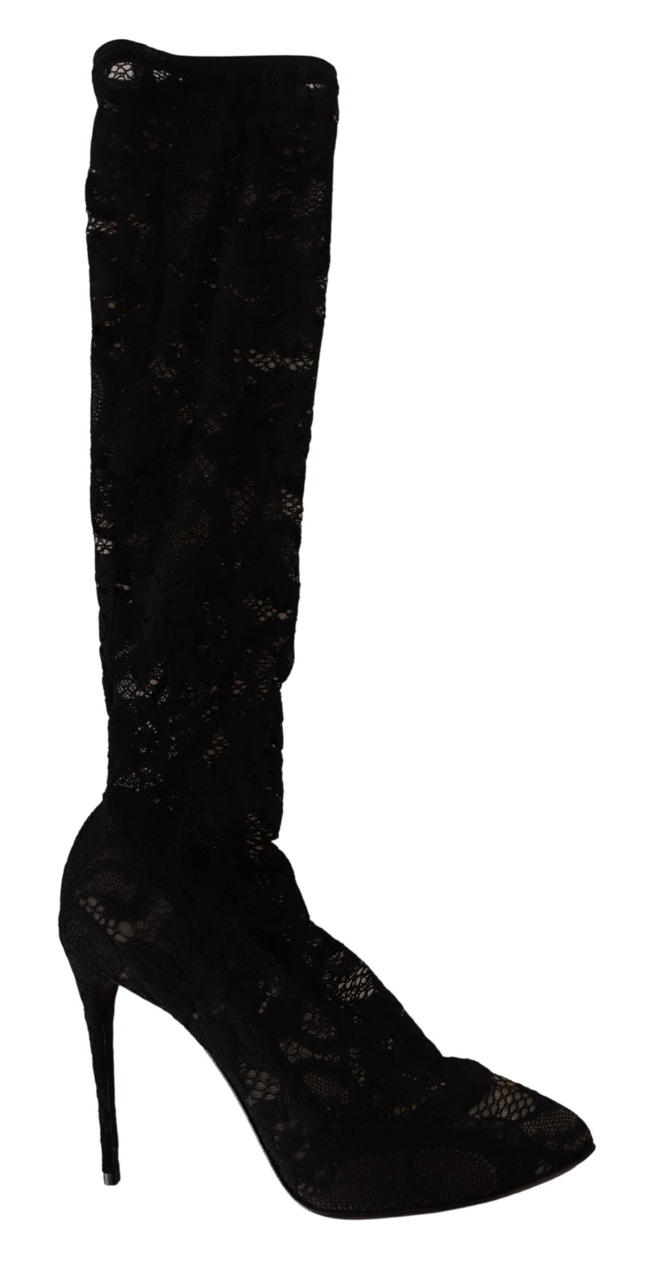 Chaussettes extensibles noires Dolce & Gabbana avec dentelle Taormina, portées avec des bottes en cuir.
