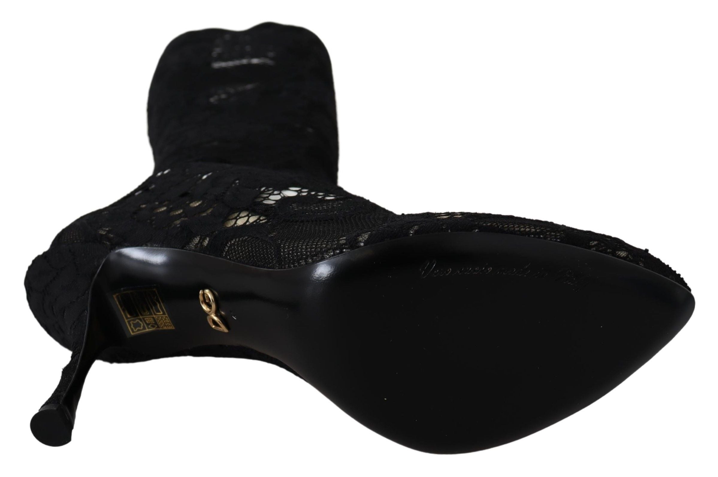 Chaussures Dolce & Gabbana Taormina noires en dentelle, bottines ou pumps, avec détails élégants visibles sur l'image.