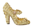 Chaussures Mary Janes dorées Dolce & Gabbana avec motifs floraux et cristaux, élégantes et sophistiquées.