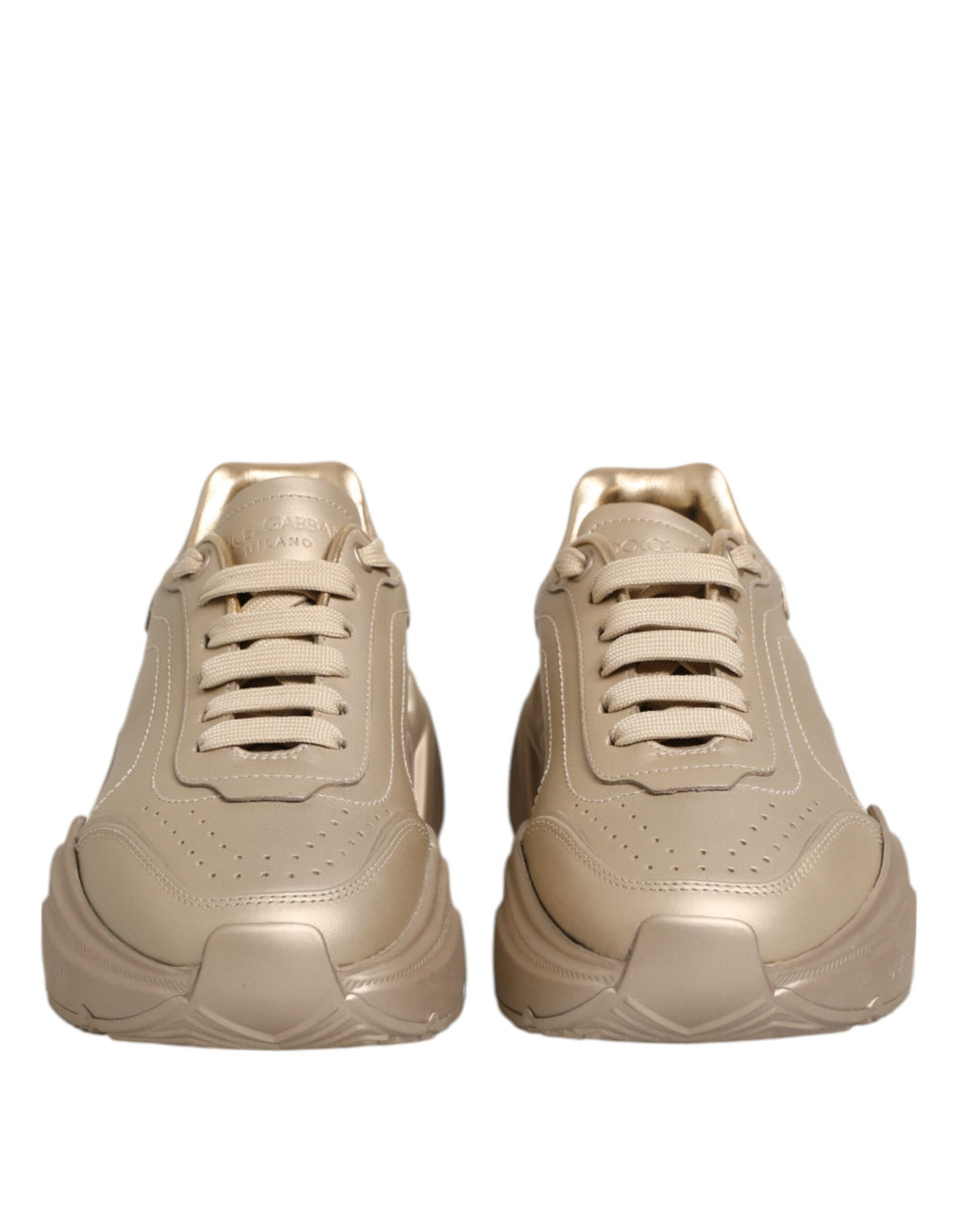 Chaussures sneakers Daymaster pour femmes en cuir doré Dolce & Gabbana, style élégant et moderne.