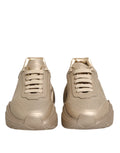 Chaussures sneakers Daymaster pour femmes en cuir doré Dolce & Gabbana, style élégant et moderne.