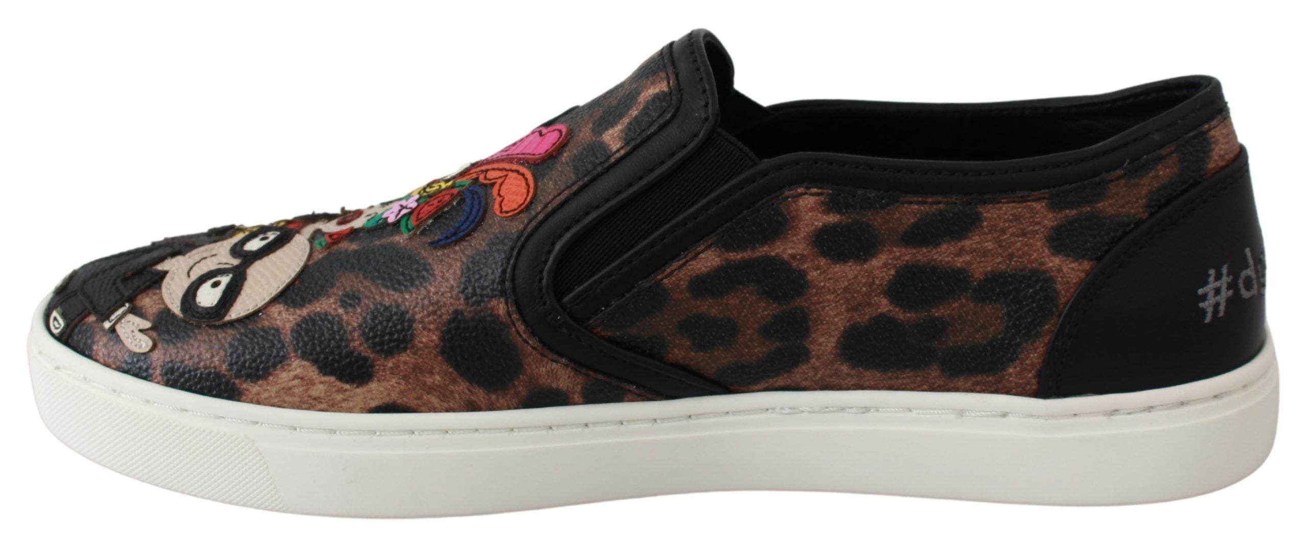 Chaussures loafers en cuir Dolce & Gabbana avec motif léopard, style élégant et sophistiqué.
