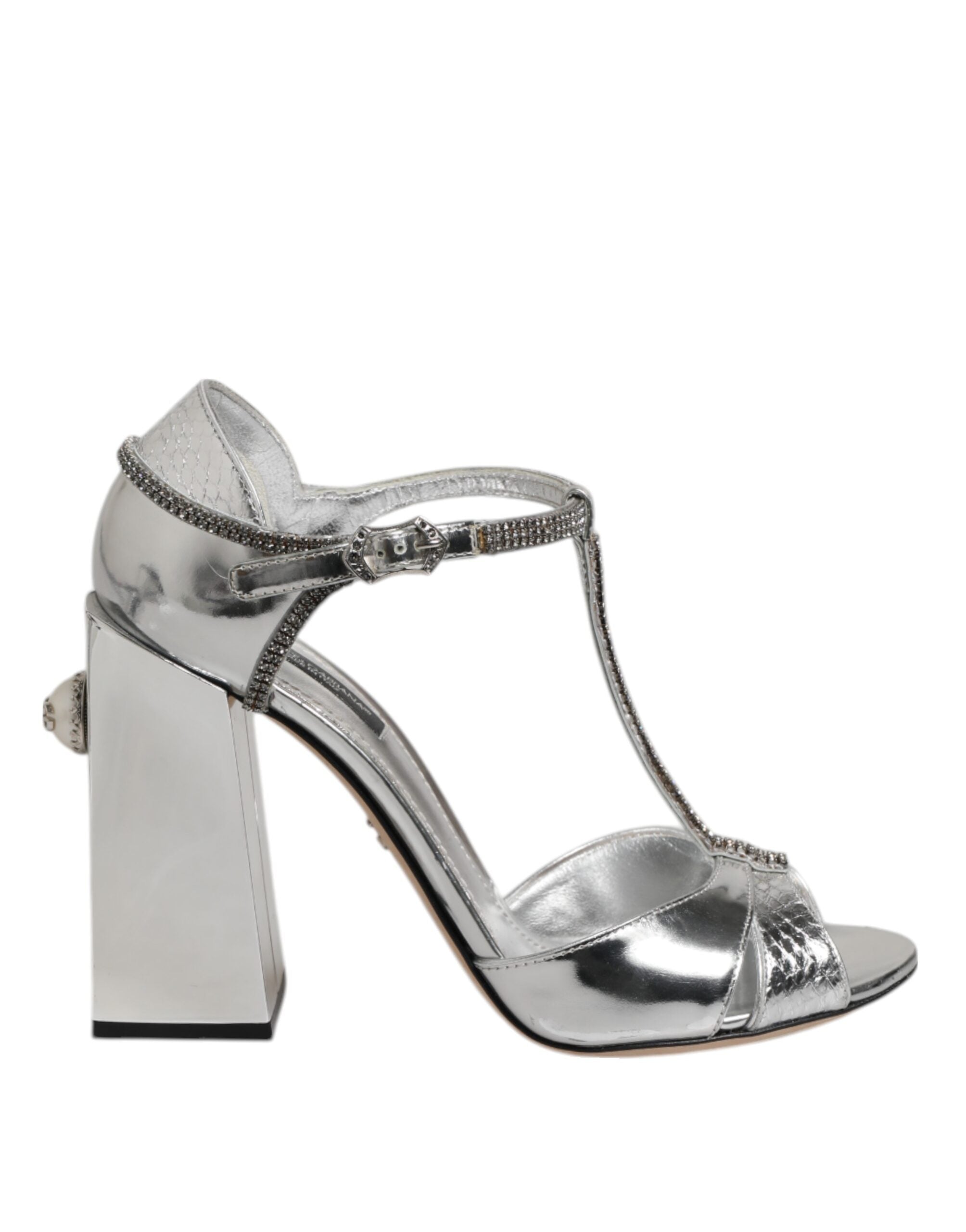 Sandales à talons en cuir argenté Dolce & Gabbana avec bride T-strap, chaussures élégantes et sophistiquées.