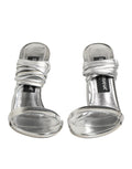 Sandales à talons hauts dorées Dolce & Gabbana avec lanières fines et design élégant, vue de côté.