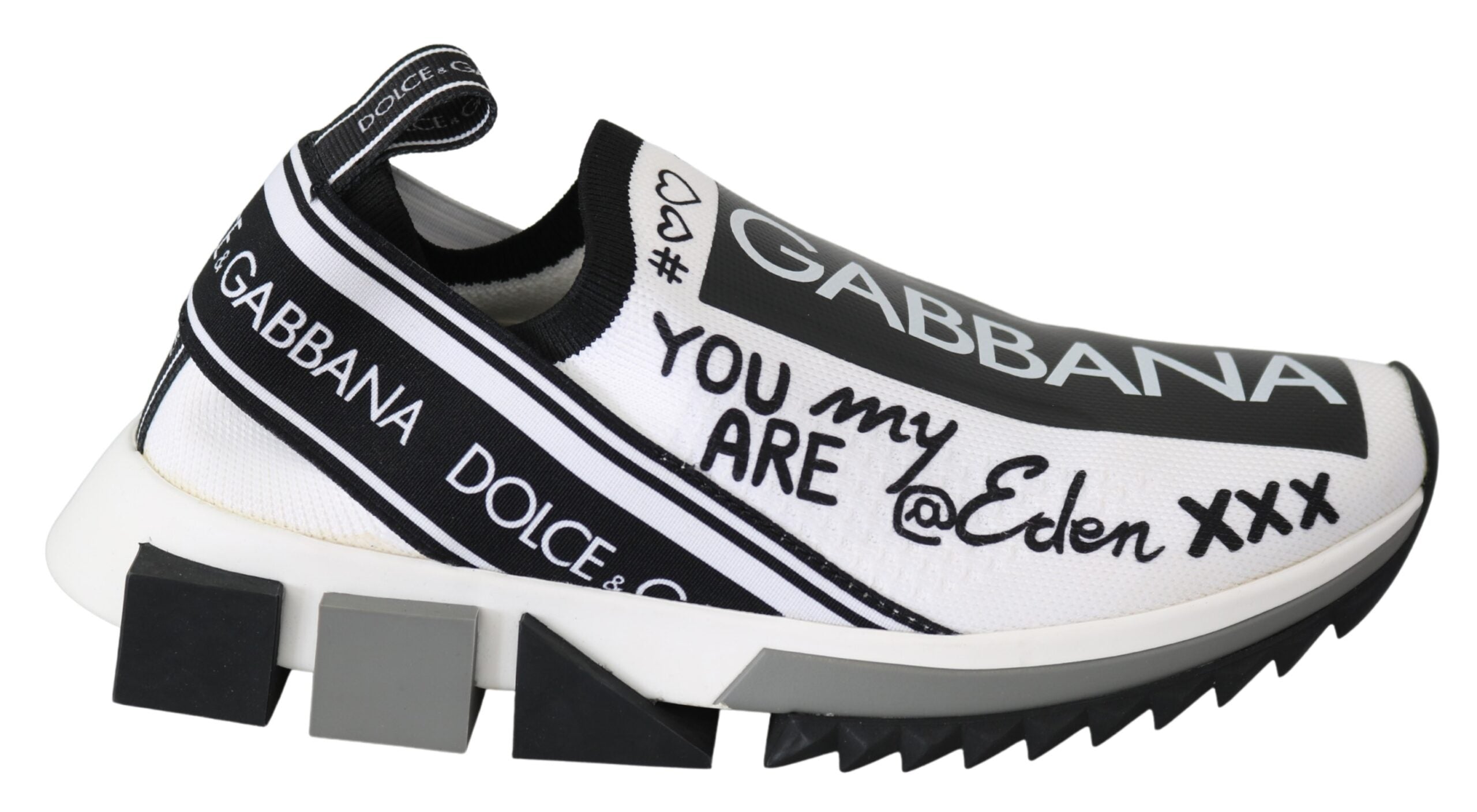 Chaussures sneakers Dolce & Gabbana Sorrento blanches et noires, style slip-on, visibles en gros plan.