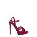 Sandales plateforme en cuir rose de Dolce & Gabbana, chaussures élégantes avec semelle épaisse et design sophistiqué.