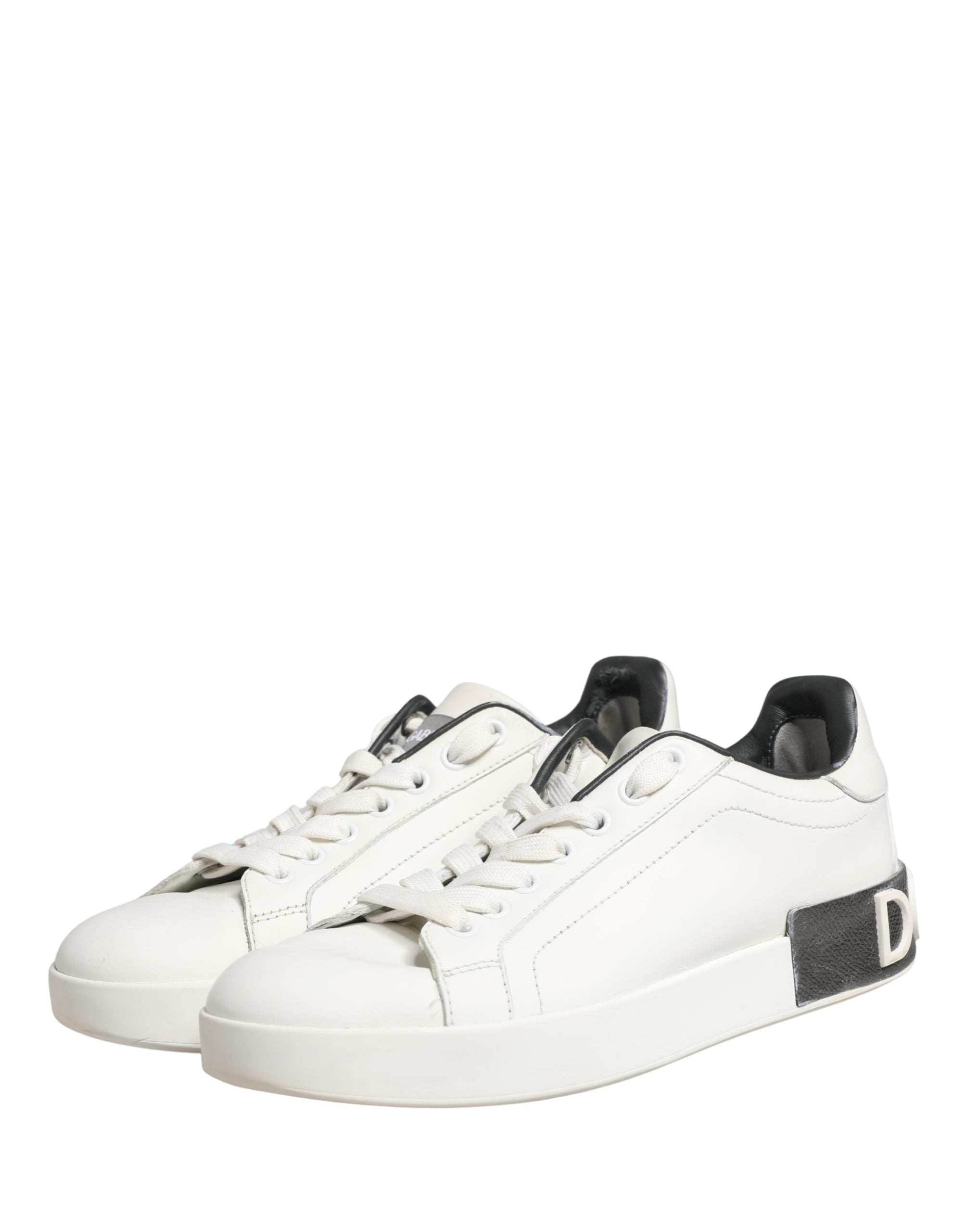 Chaussures sneakers en cuir blanc et noir Dolce & Gabbana Portofino, style élégant et moderne pour femmes.