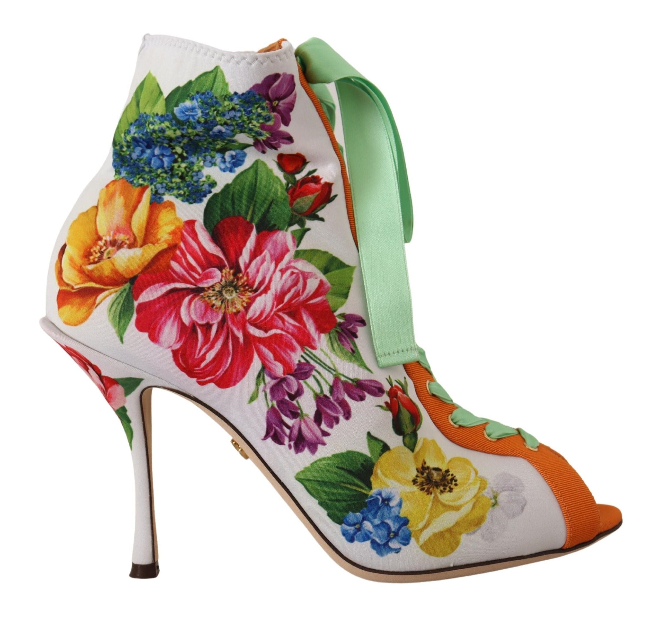 Bottes blanches en jersey extensible Dolce & Gabbana avec orteils ouverts et talons hauts élégants.