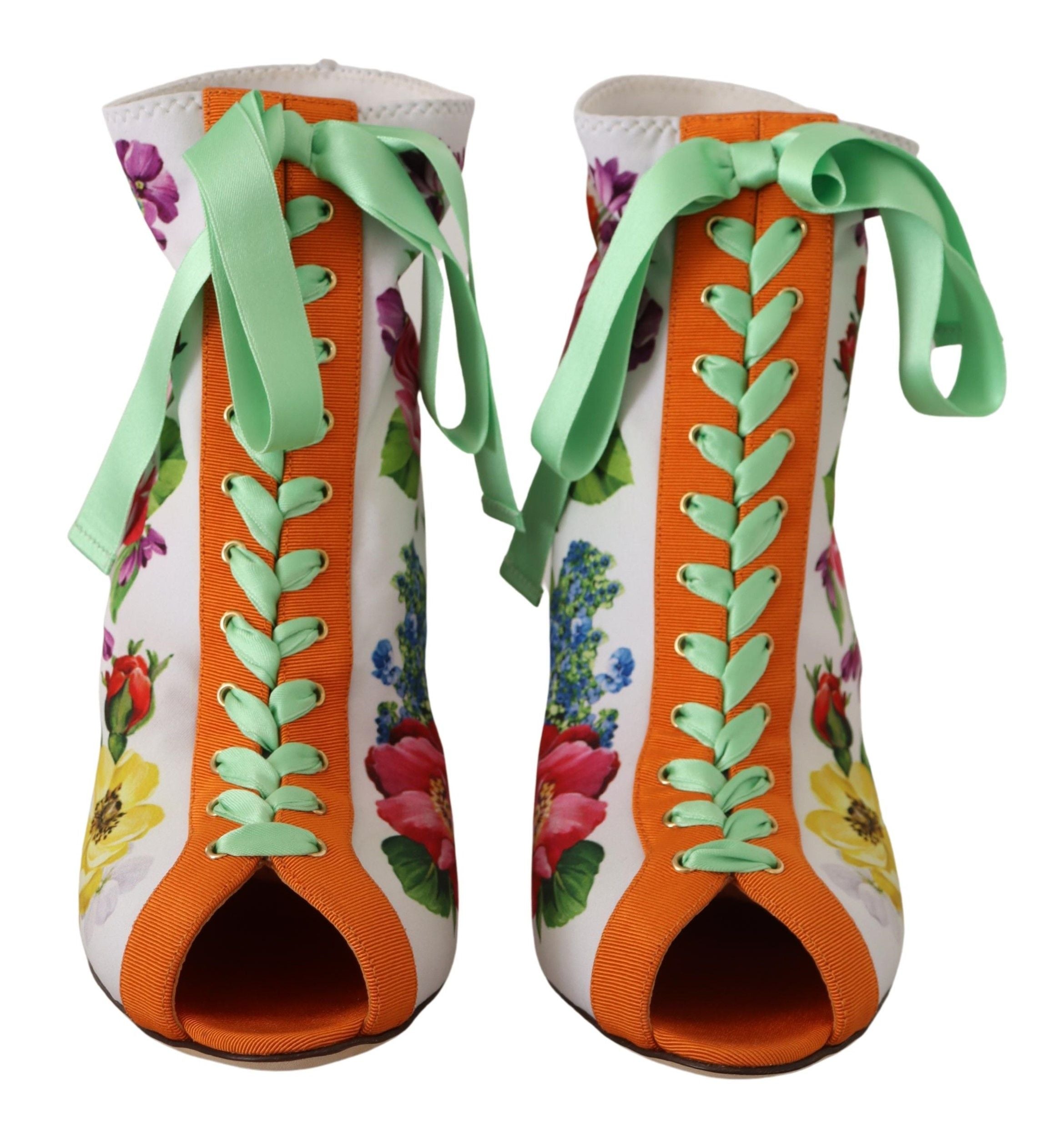 Bottes ouvertes à talons en jersey blanc Dolce & Gabbana, chaussures élégantes avec semelles souples et design moderne.