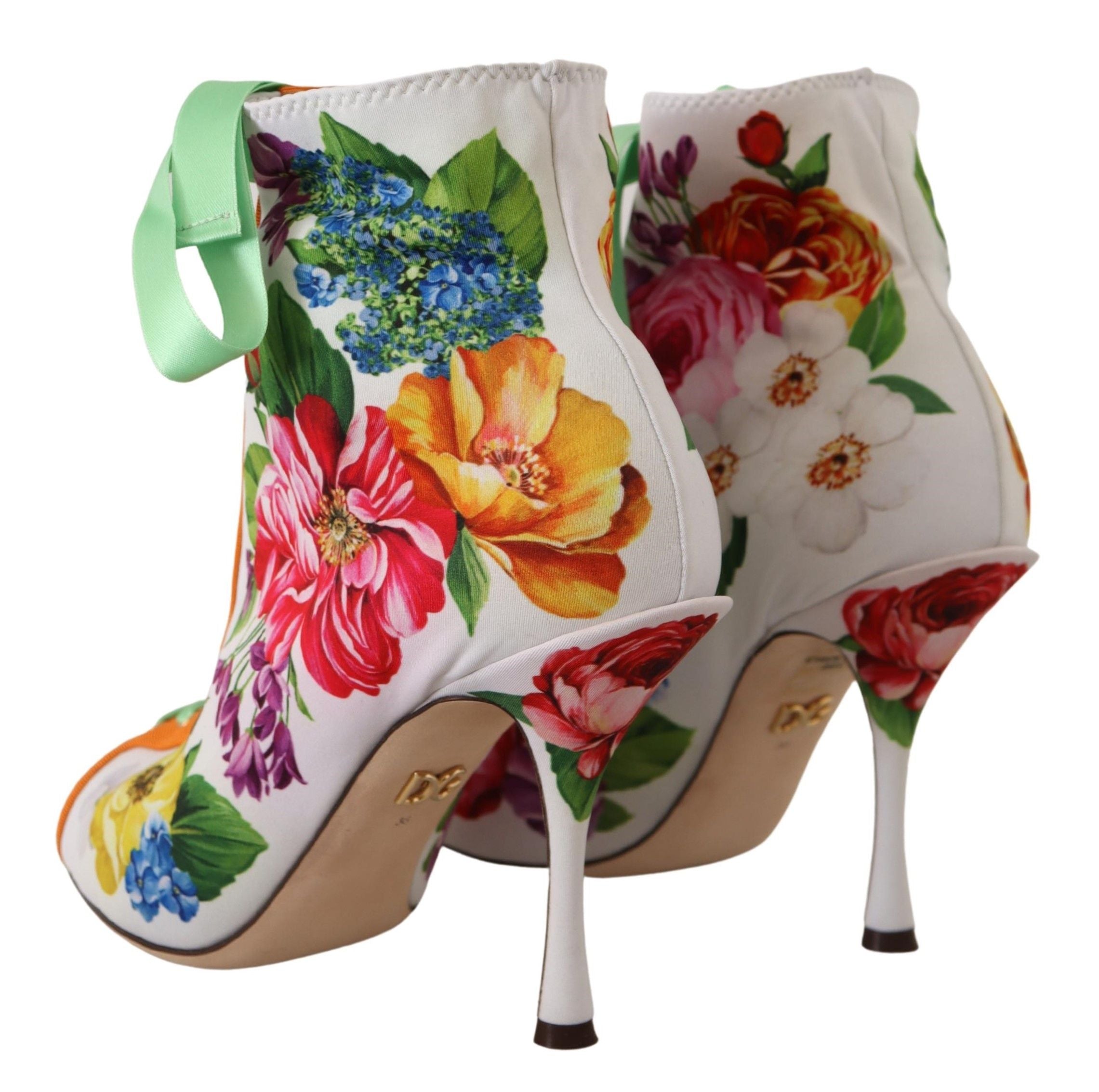 Bottes blanches en jersey stretch Dolce & Gabbana avec talons ouverts et orteils nus, chaussures élégantes pour femmes.