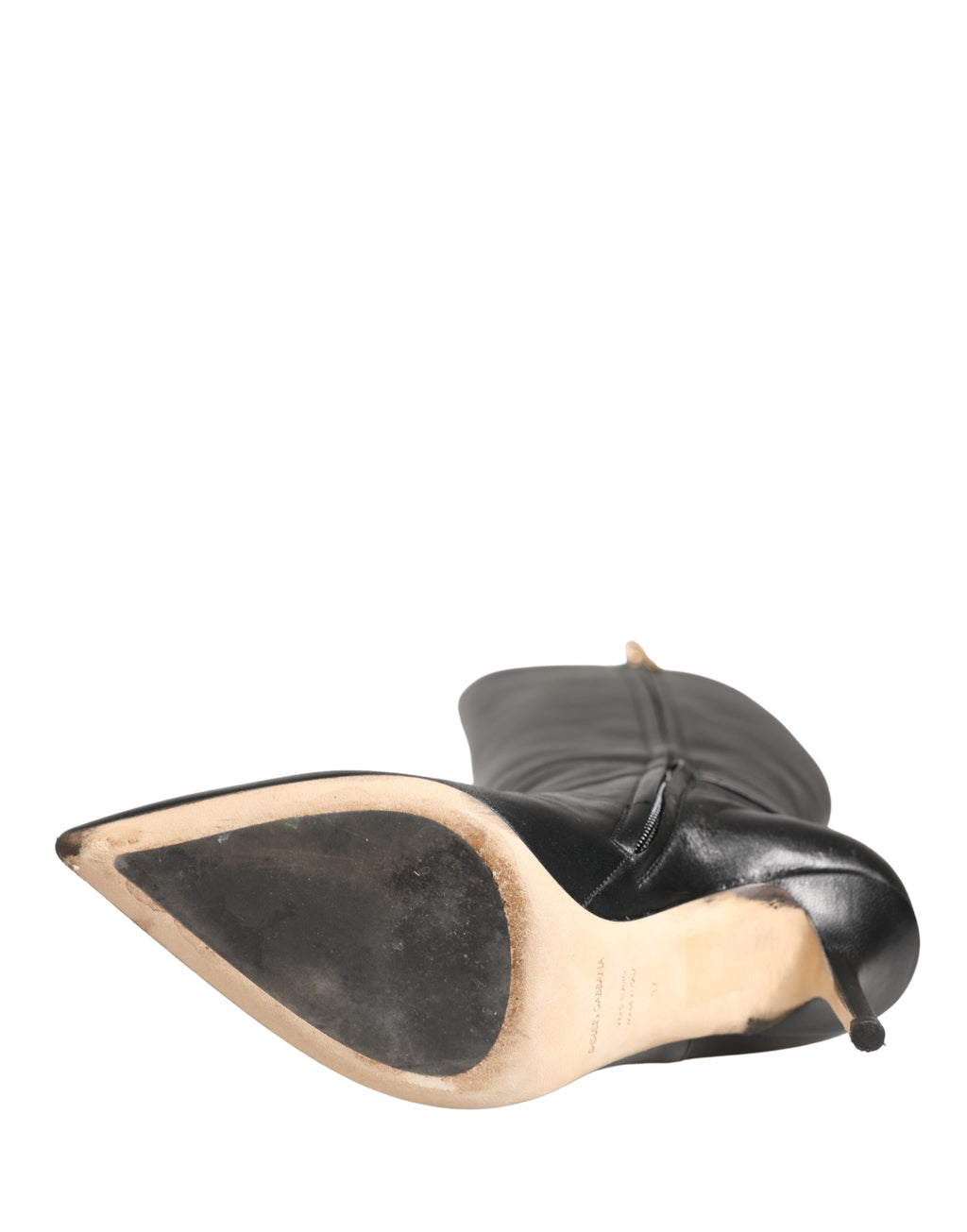 Chaussures Dolce & Gabbana en cuir noir, talons hauts et bottes hautes jusqu'au genou, élégantes et sophistiquées.