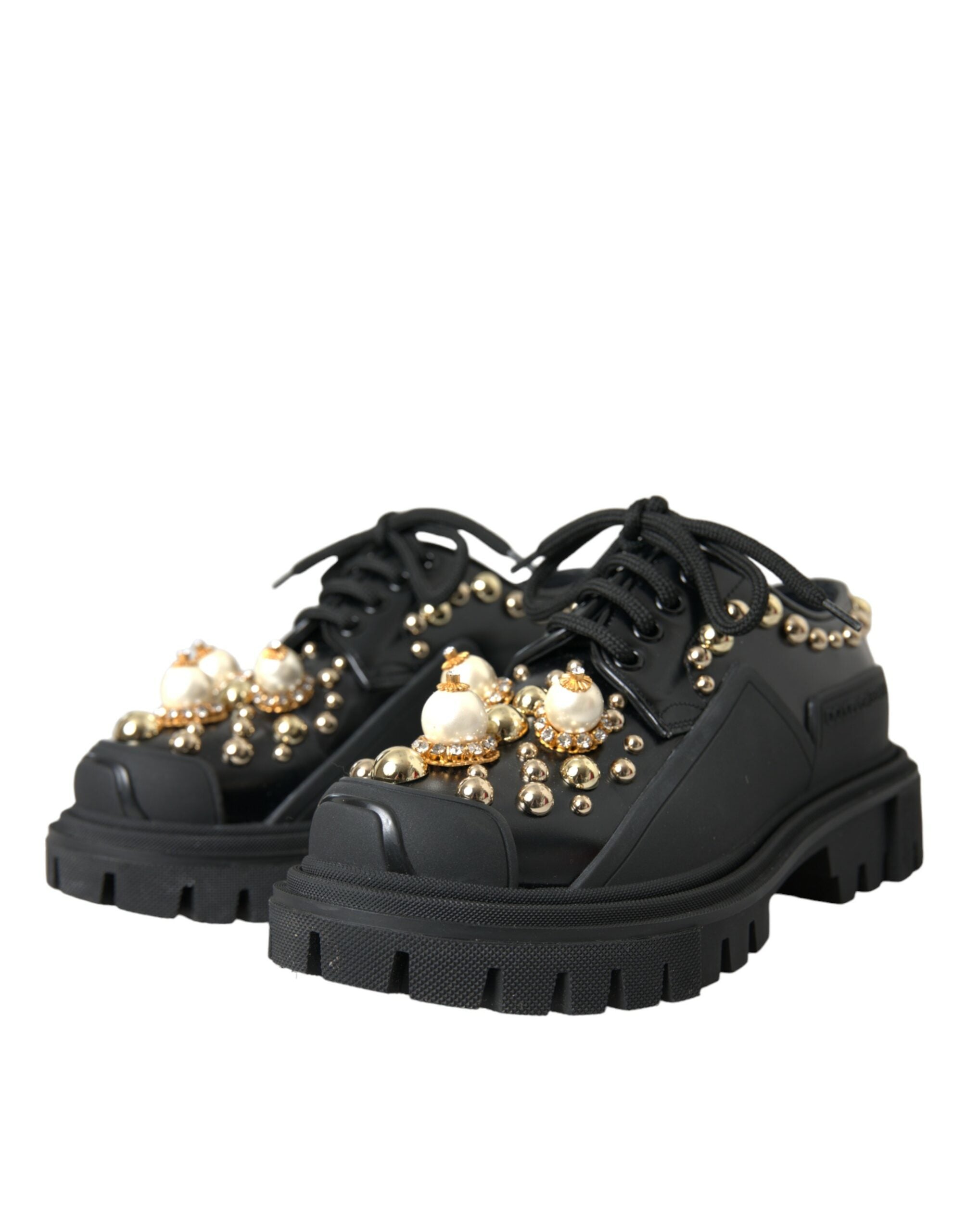 Chaussures de trekking Derby en cuir noir Dolce & Gabbana avec embellissements, détails de style robuste et élégance sophistiquée.