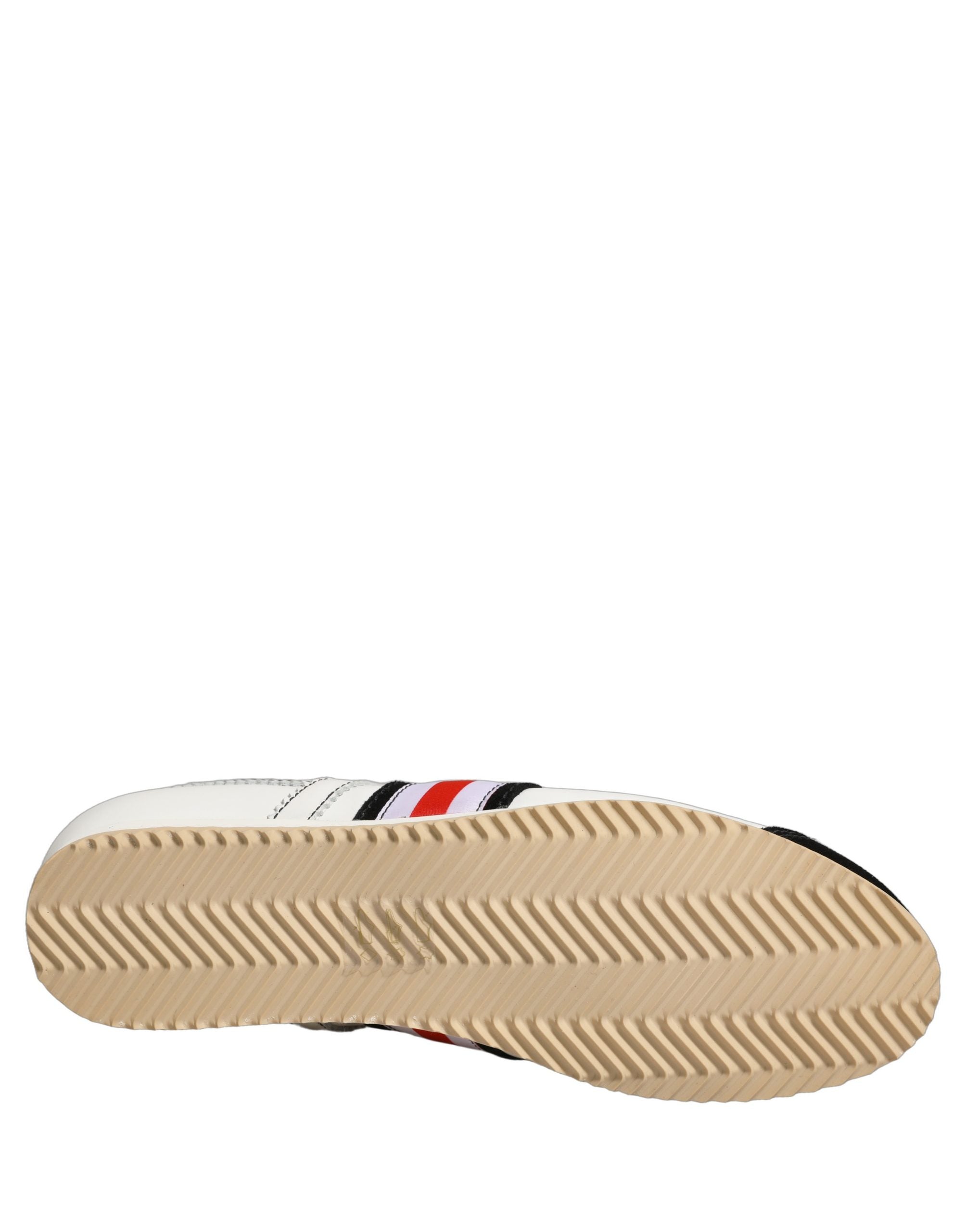 Chaussures basses Dolce & Gabbana en cuir et suède noir et blanc, sneakers décontractés pour femme.