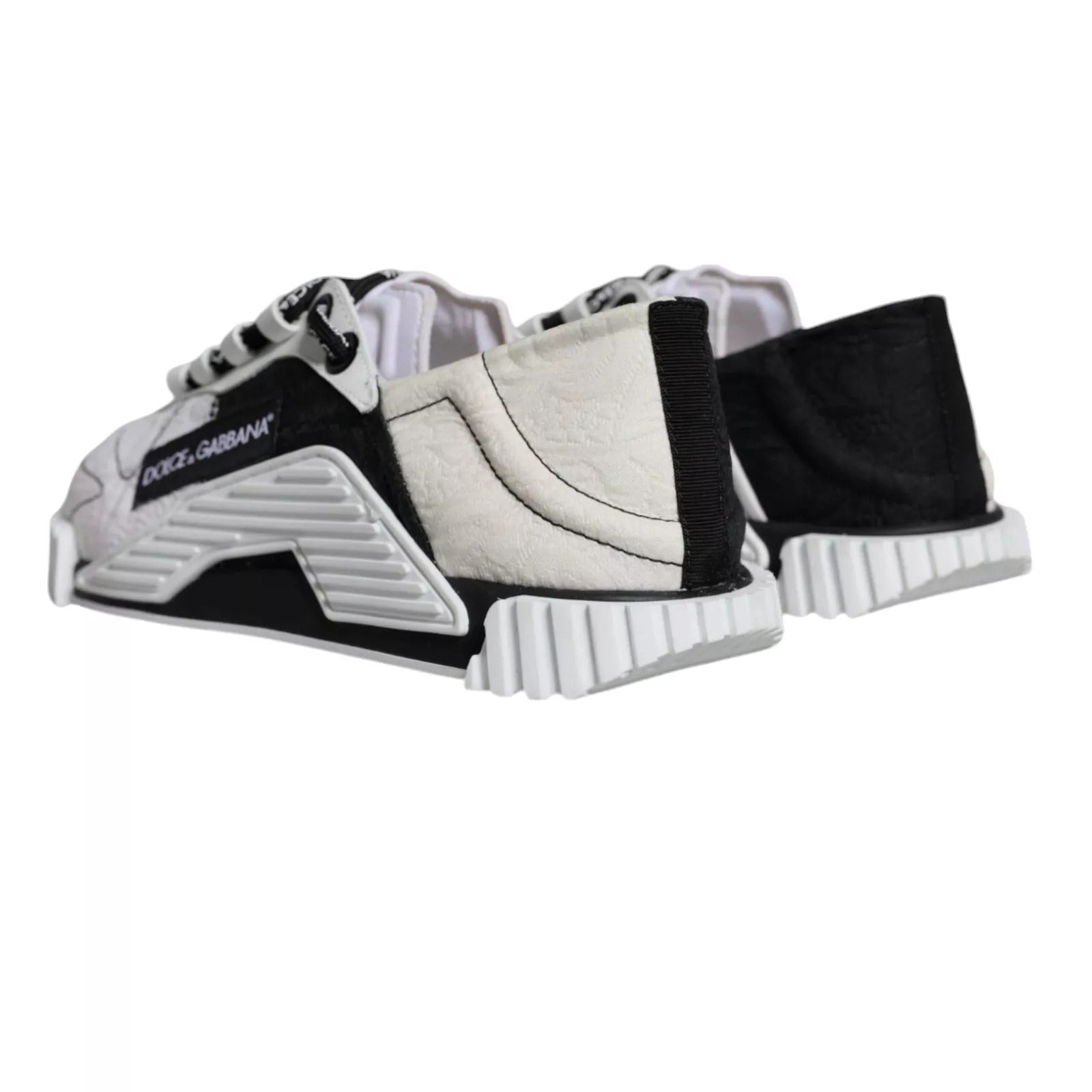 Chaussures sneakers basses Dolce & Gabbana NS1 blanches et noires, style décontracté avec design moderne et détails tendance.