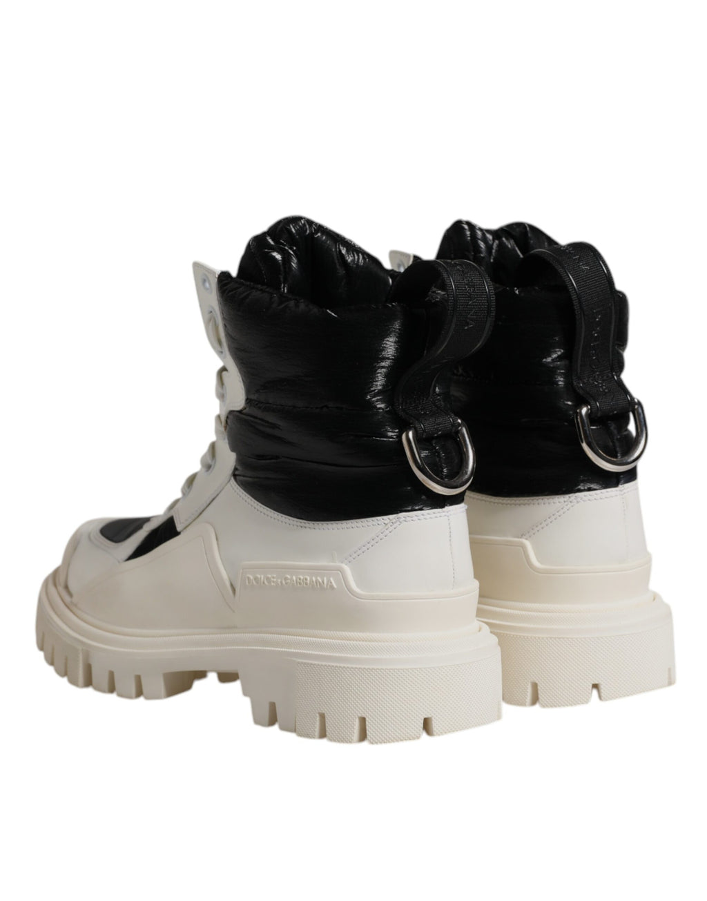 Bottes mi-mollet en cuir blanc Dolce & Gabbana avec lacets, rembourrage padding et semelle en caoutchouc, mode élégante.
