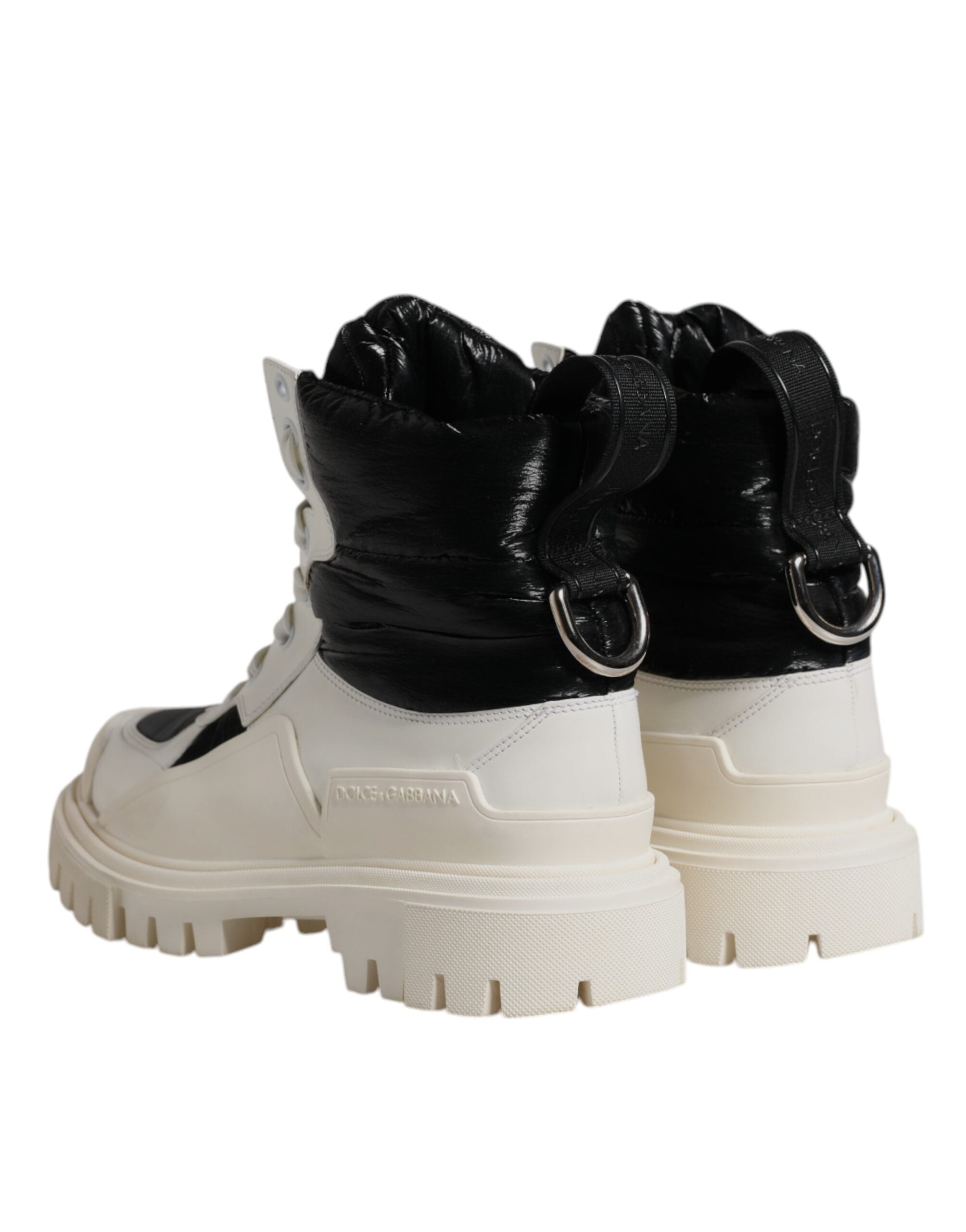 Bottes mi-mollet en cuir blanc Dolce & Gabbana avec lacets, rembourrage padding et semelle en caoutchouc, mode élégante.