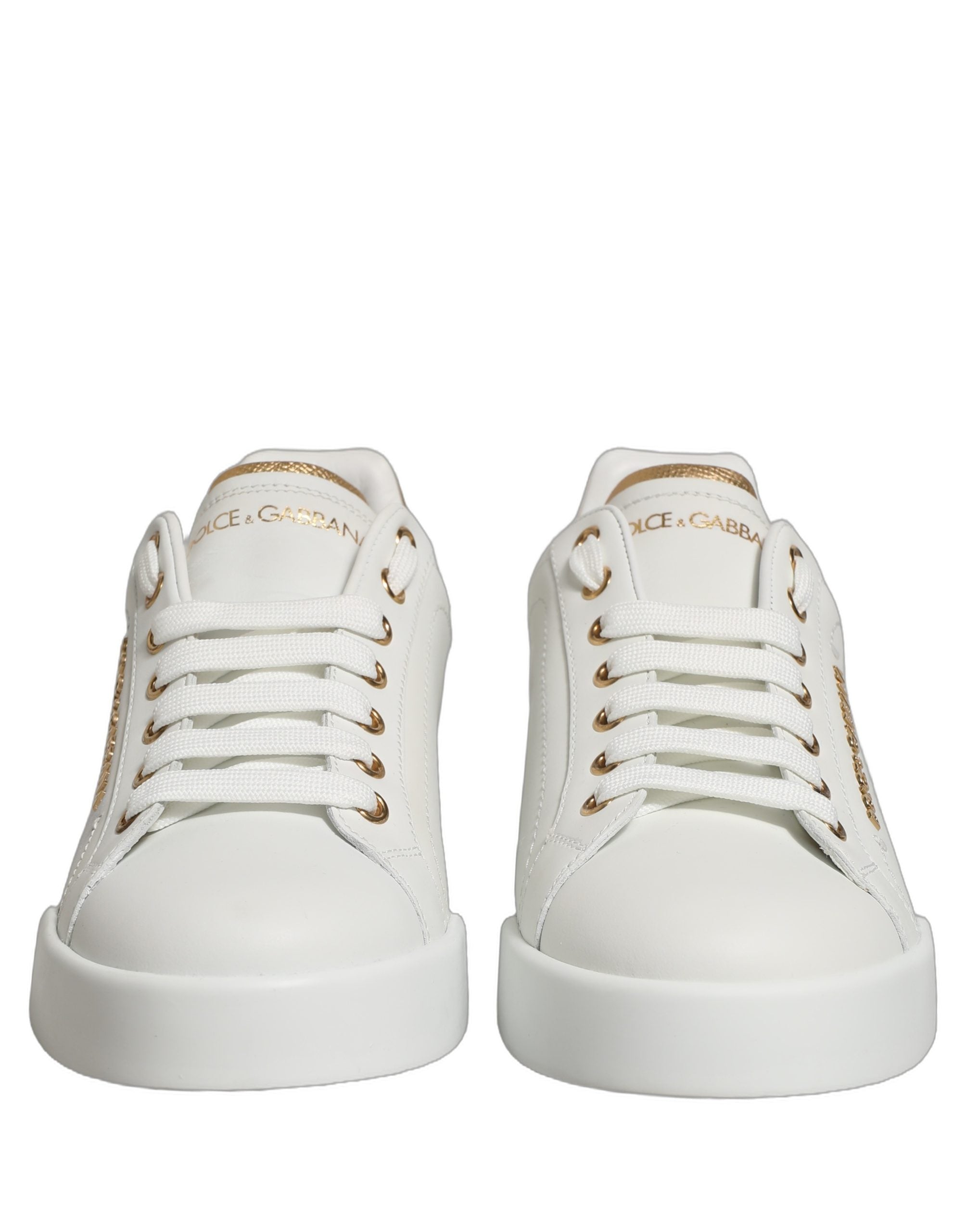Chaussures sneakers basses blanches Dolce & Gabbana avec embellissements en or et détails élégants, style moderne et sophistiqué.