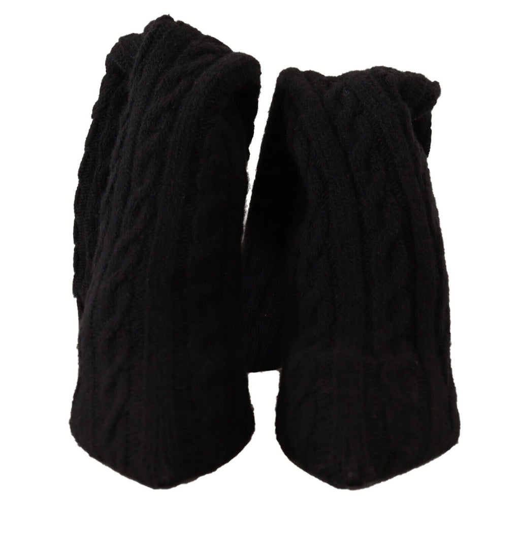 Chaussettes noires extensibles Dolce & Gabbana, porté avec bottines hautes, vue de côté sur chaussures élégantes.
