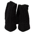 Chaussettes noires extensibles Dolce & Gabbana, porté avec bottines hautes, vue de côté sur chaussures élégantes.