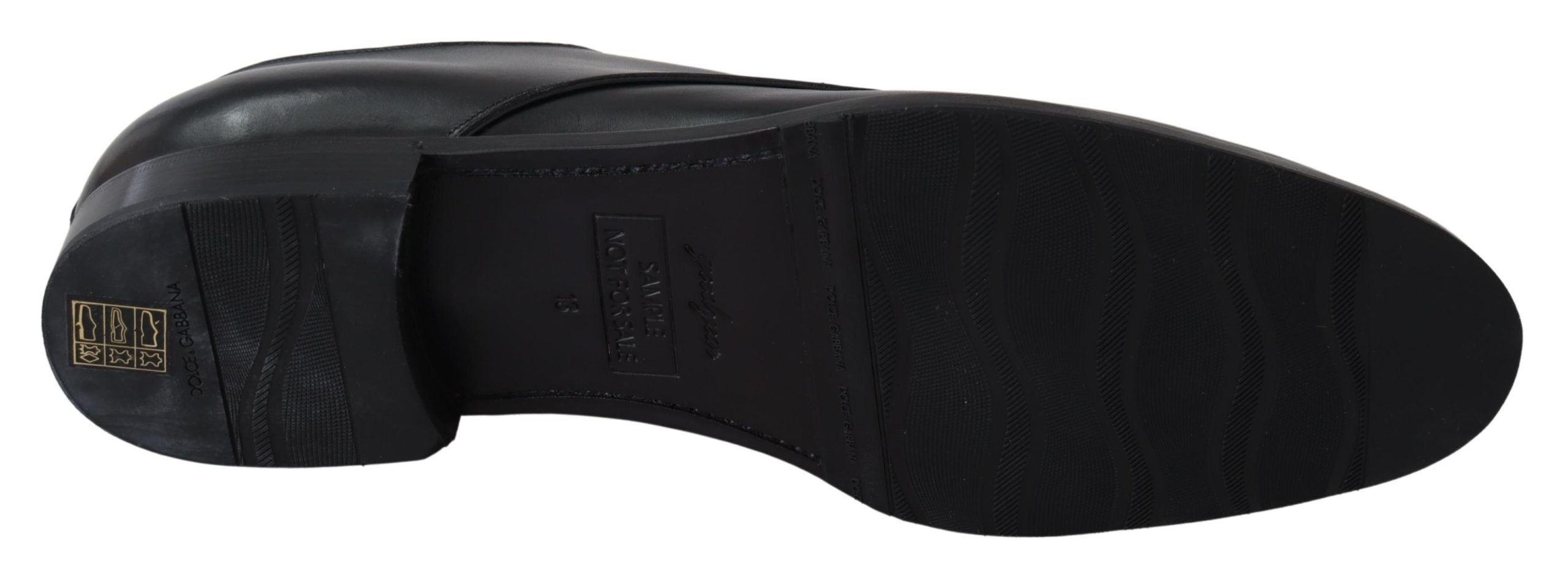 Chaussures en cuir noir Dolce & Gabbana SARTORIA faites à la main, élégantes et sophistiquées, vue de face.