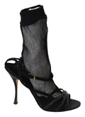 Chaussures Dolce & Gabbana en daim noir, bottines courtes avec semelles en cuir et design élégant.