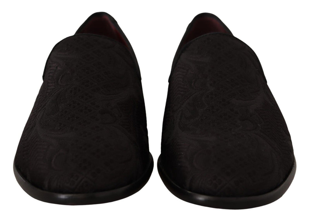 Mules noires Dolce & Gabbana en brocart floral, chaussures élégantes en velours avec motifs floraux raffinés.