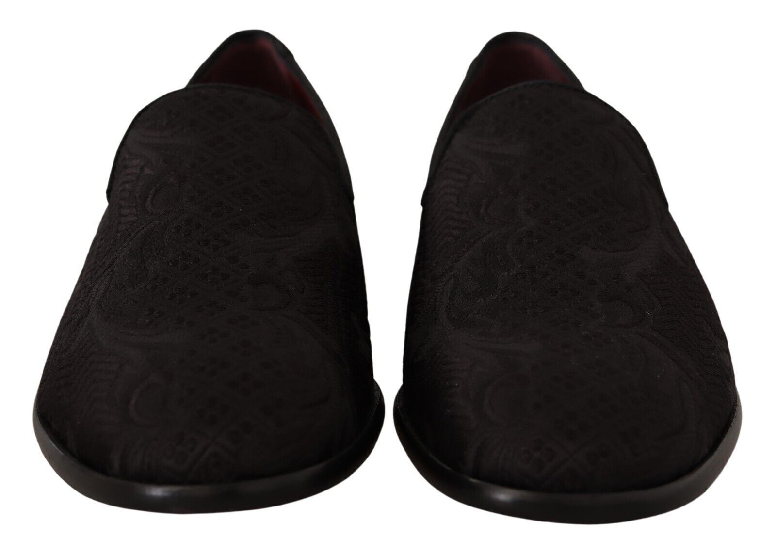Mules noires Dolce & Gabbana en brocart floral, chaussures élégantes en velours avec motifs floraux raffinés.