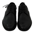 Chaussures Derby en cuir noir de Dolce & Gabbana, chaussures formelles élégantes pour homme.