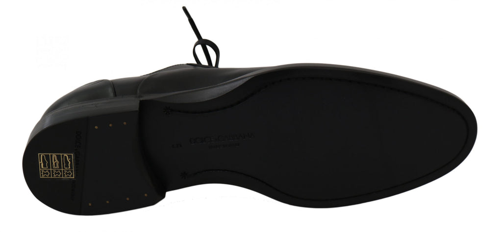 Chaussures derby en cuir noir Dolce & Gabbana pour homme, élégantes et formelles.