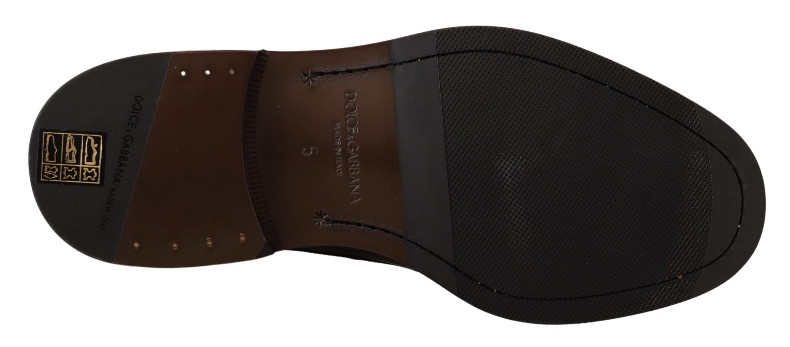 Chaussures Derby noires en cuir de luxe Dolce & Gabbana pour homme, style formel et élégant.