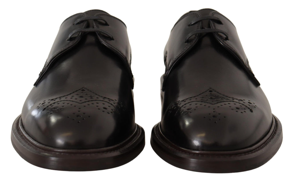 Chaussures derby noires en cuir de luxe Dolce & Gabbana pour homme, élégantes et formelles, vues de face.