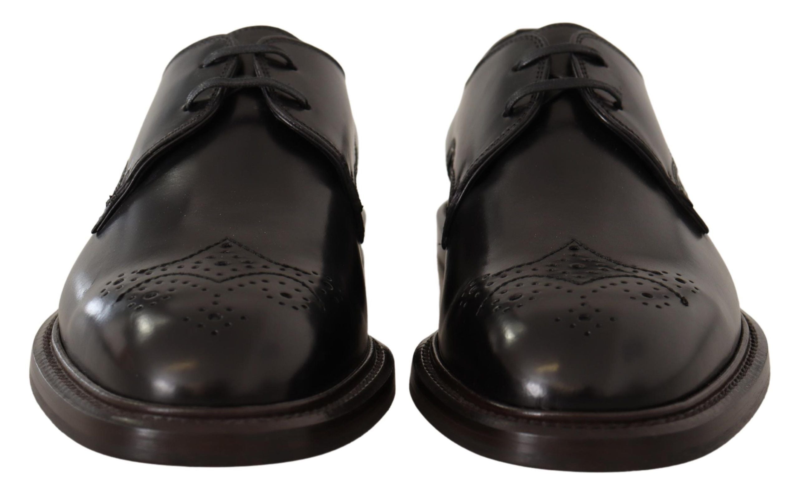 Chaussures derby noires en cuir de luxe Dolce & Gabbana pour homme, élégantes et formelles, vues de face.
