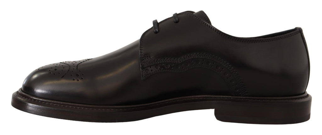 Chaussures Derby noires en cuir Dolce & Gabbana, élégantes et formelles pour homme, visibles en gros plan.
