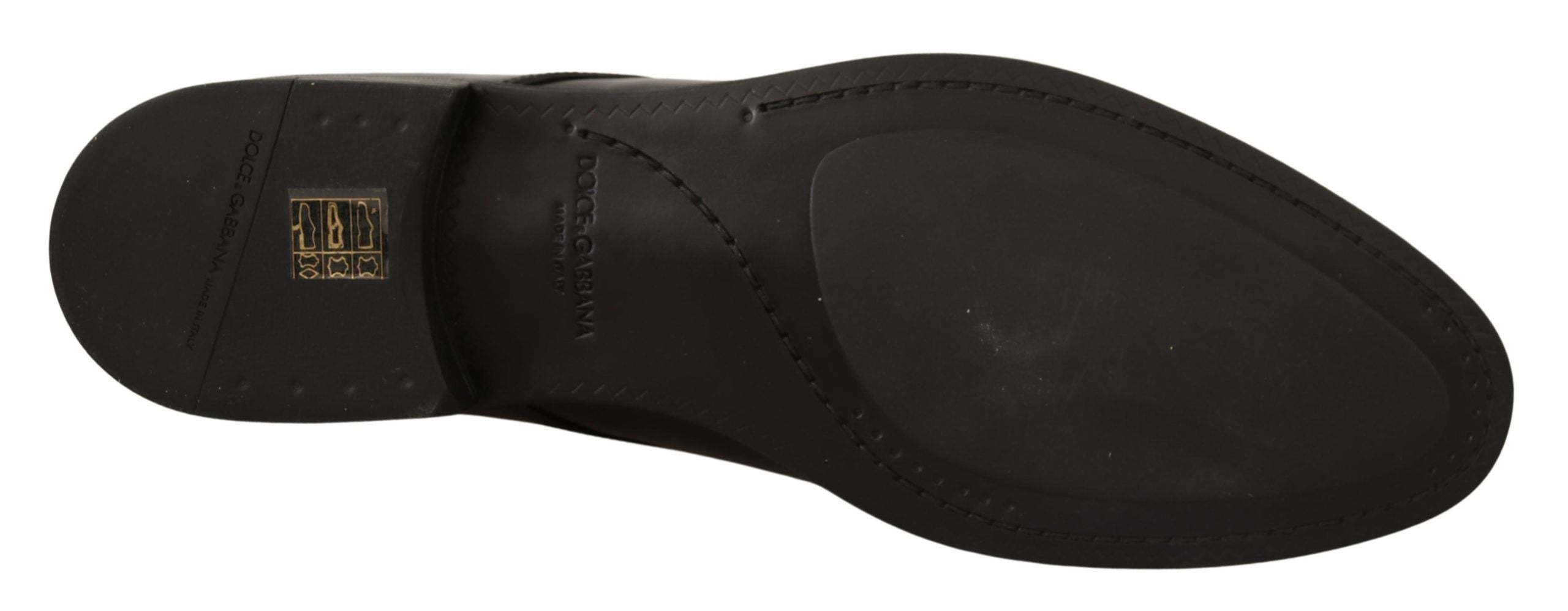Chaussures derby en cuir noir pour homme de Dolce & Gabbana, lacées et élégantes, parfaites pour une tenue formelle.