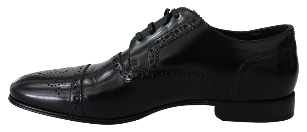 Chaussures Derbies pour homme Dolce & Gabbana en cuir noir, élégantes et formelles, avec finition lisse et semelle en caoutchouc.