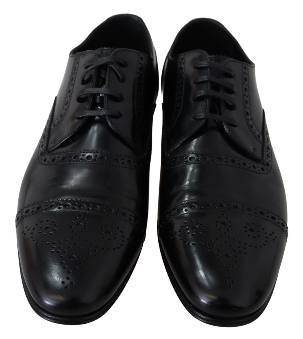 Chaussures Derby en cuir noir pour homme de Dolce & Gabbana, loafers formels élégants et sophistiqués.
