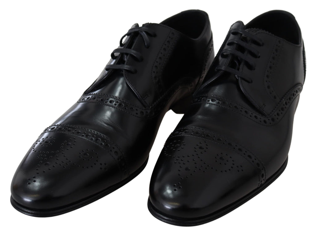 Chaussures Derby formelles en cuir noir de Dolce & Gabbana pour hommes, loafers élégants avec finition lisse.