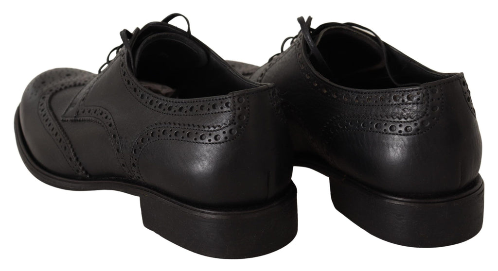 Chaussures oxford noires en cuir Dolce & Gabbana avec détails wingtip pour homme, chaussures formelles élégantes.