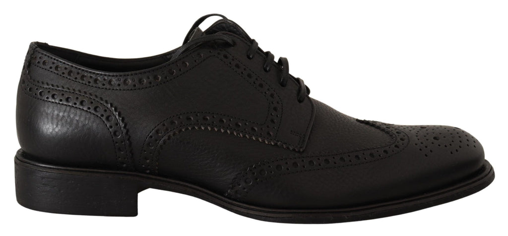 Chaussures de ville en cuir noir Dolce & Gabbana, derby wingtip élégantes pour homme, détails en cuir et semelle en caoutchouc.