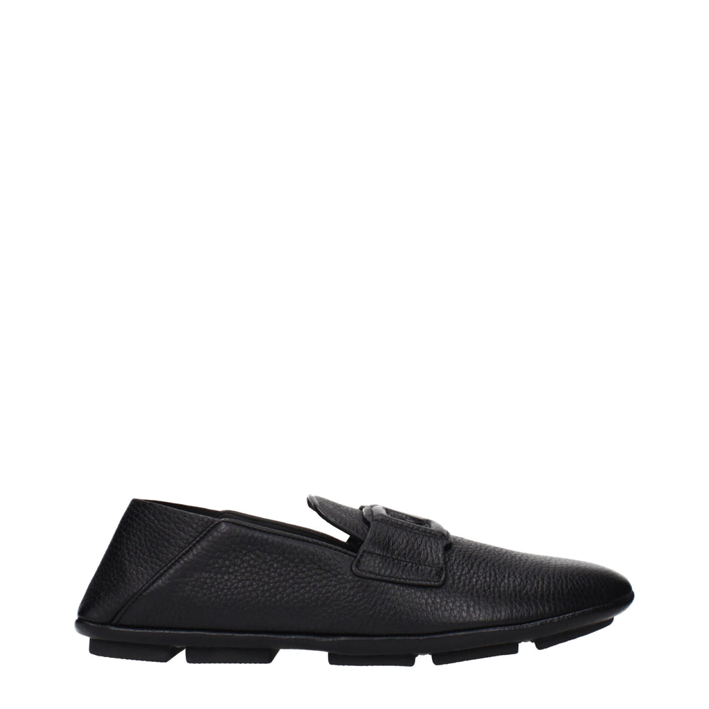 Chaussures mocassins en cuir noir Dolce & Gabbana, slip-on élégants pour homme, avec finition lisse et semelle en caoutchouc.