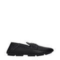Chaussures mocassins en cuir noir Dolce & Gabbana, slip-on élégants pour homme, avec finition lisse et semelle en caoutchouc.