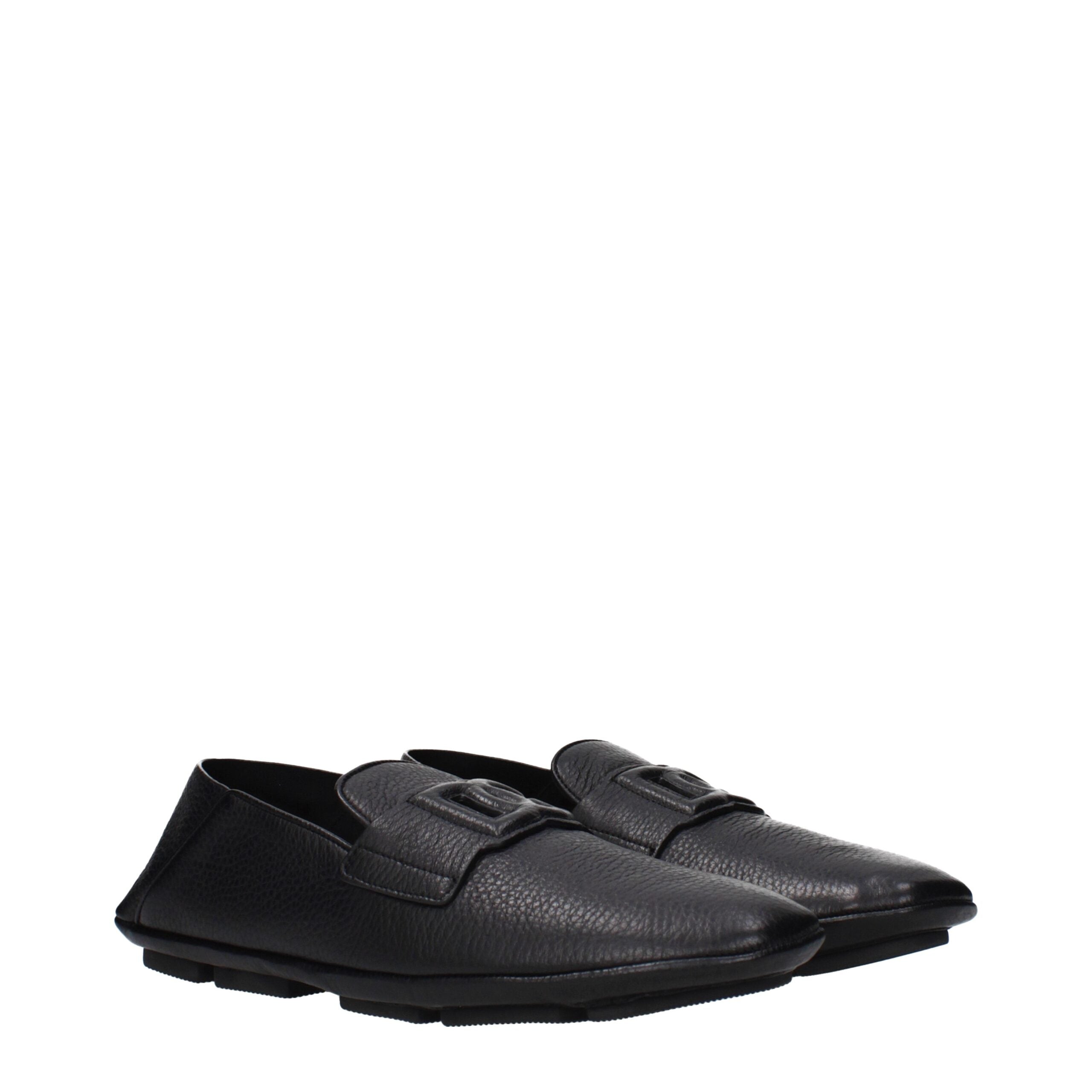 Chaussures mocassins en cuir noir Dolce & Gabbana pour homme, glissière facile à enfiler, finition élégante et raffinée.